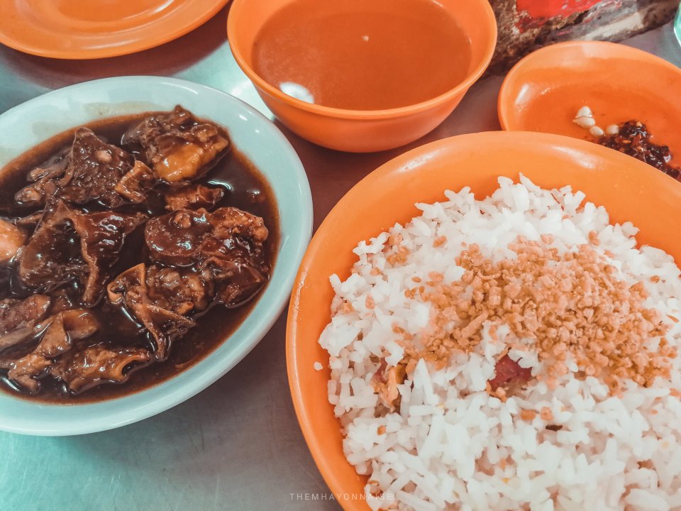 beef pares served with fried rice, chili sauce, and soup